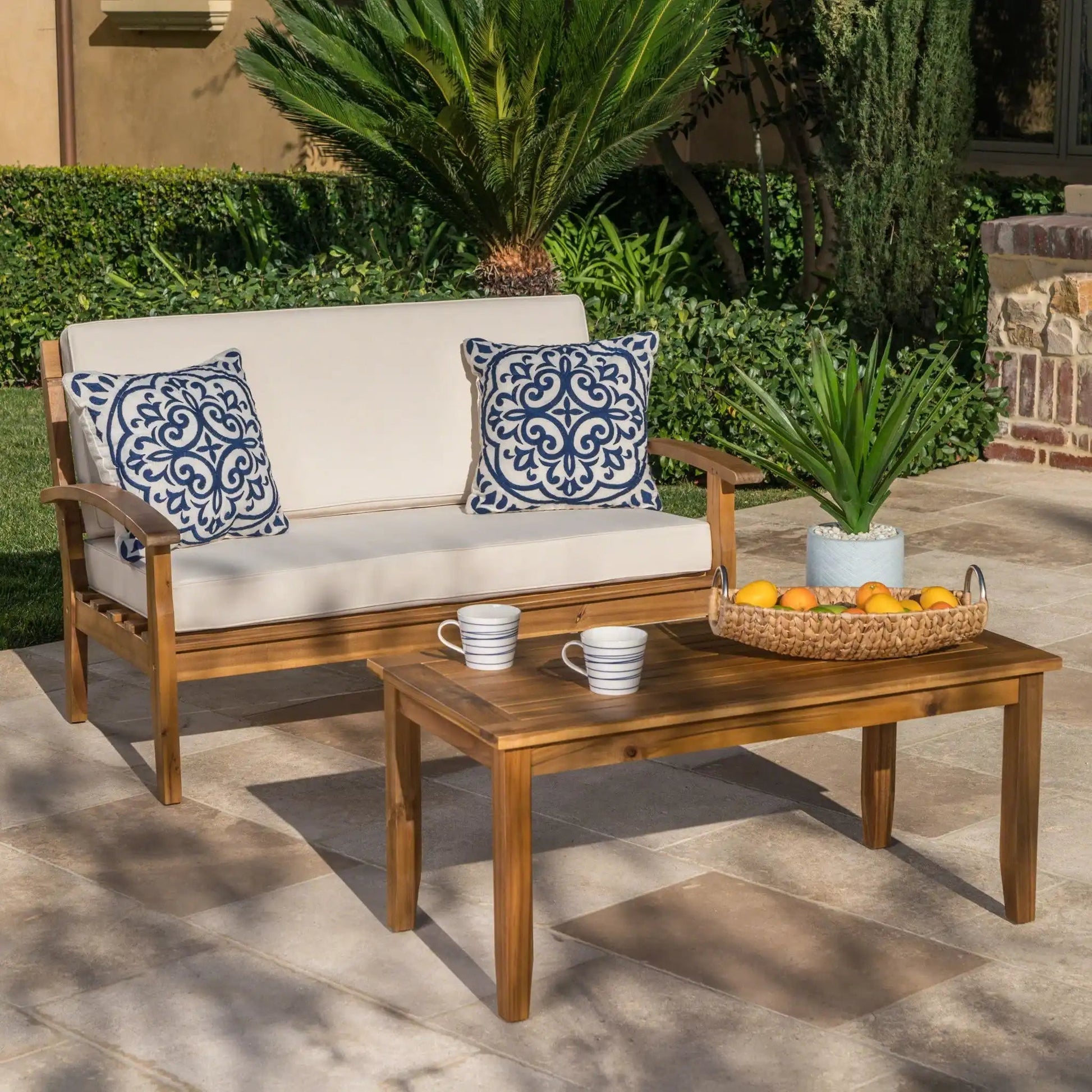 Outdoor chat set with coffee table and loveseat, 2-piece, wood frame beige cushions on Tampa Home & Garden Store