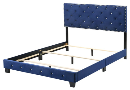 Luxurious Upholstered Bed with blue tufted headboard, crystal studs, black metal frame on Tampa Home & Garden Store