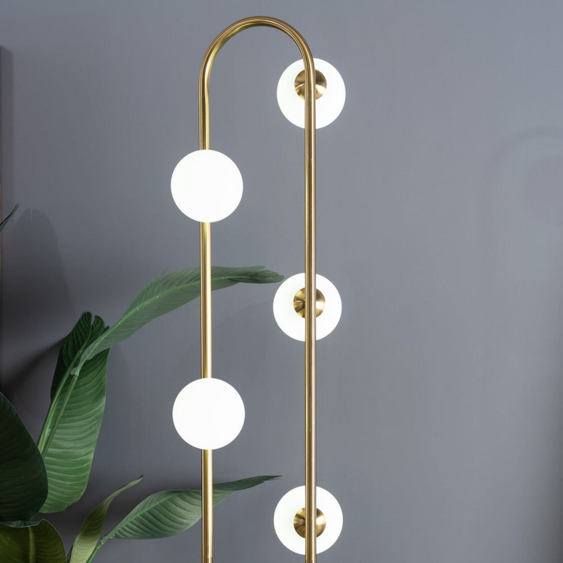 Artema floor lamp in gold with frosted globe bulbs, HouseOfZazla design on Tampa Home & Garden Store