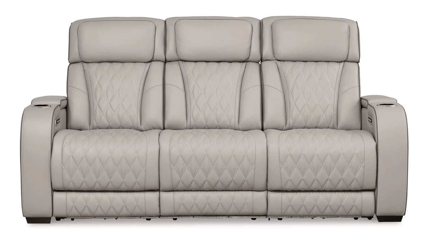 Boyington power reclining sofa with adj headrests, beige quilted leather, 3-seat cupholders on Tampa Home & Garden Store