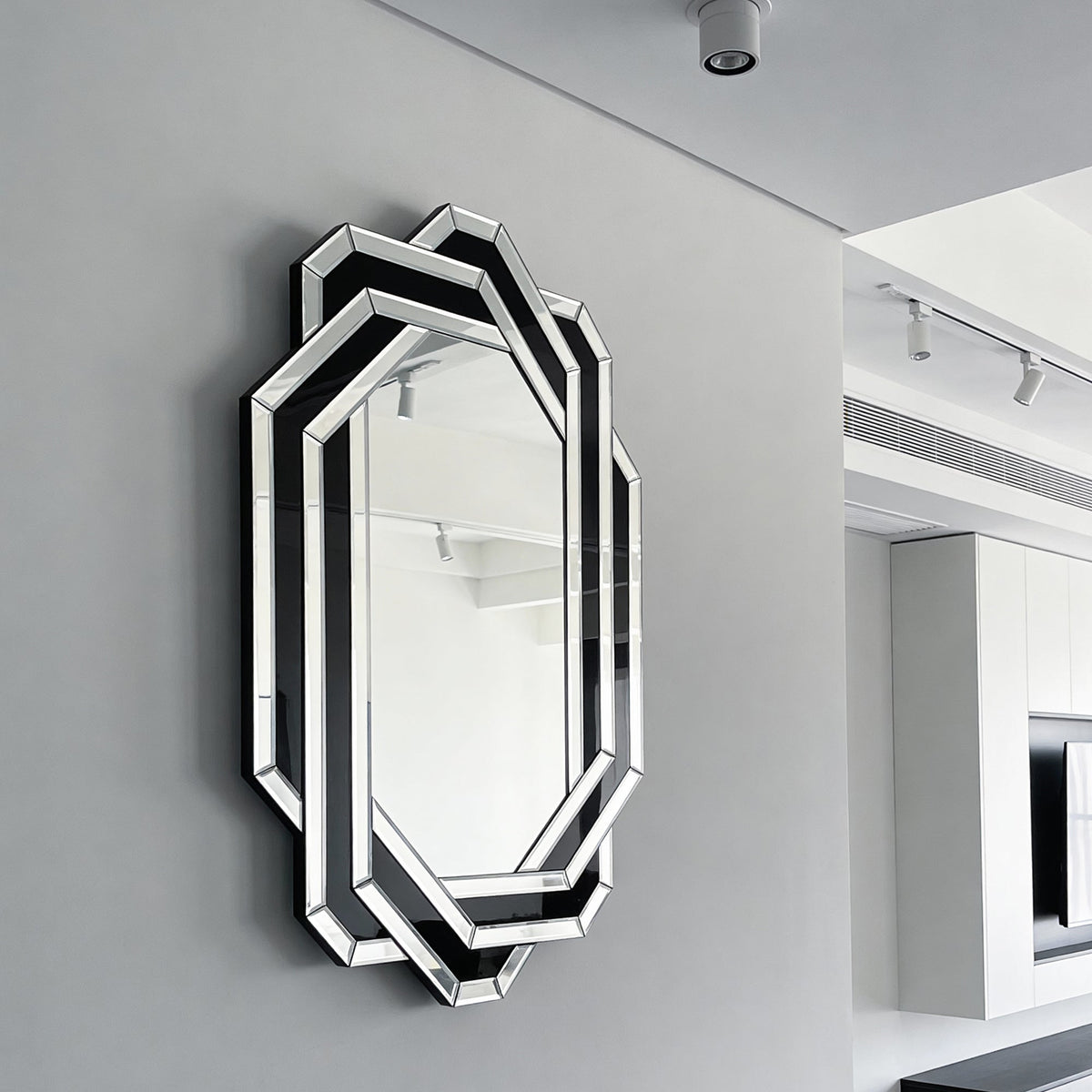 Modern decorative wall mirror with octagonal panels in black and chrome trim HouseOfZazla on Tampa Home & Garden Store