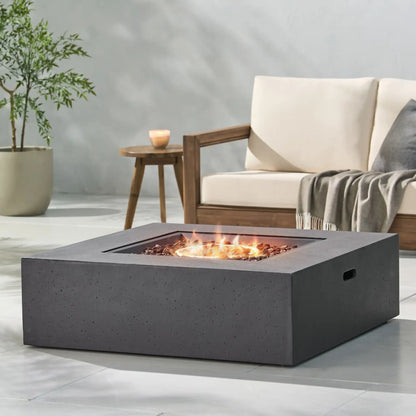 Modern square fire table in dark gray concrete-look with 50,000 BTU burner for outdoor living on Tampa Home & Garden Store
