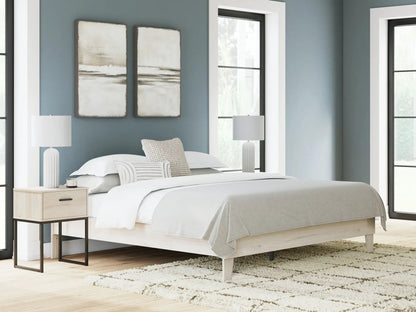 Socalle Platform Bed with light wood frame and black metal legs in a blue-gray bedroom on Tampa Home & Garden Store