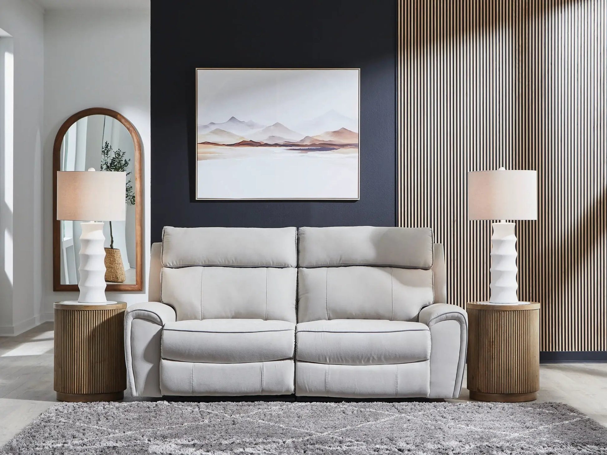 Social Pointe reclining sectional by Unique Piece Furniture in light gray fabric with plush cushions in living room on Tampa Home & Garden Store