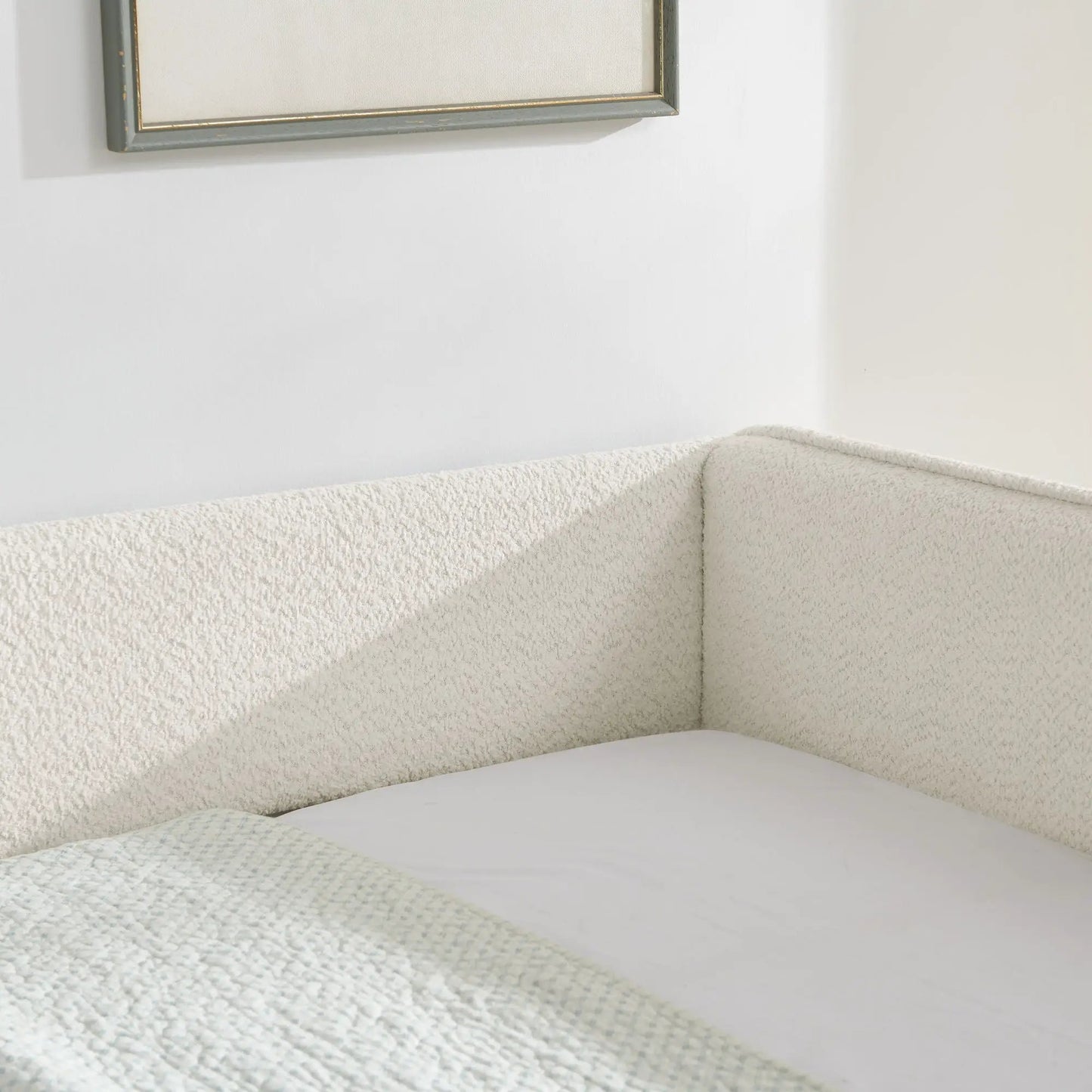 Upholstered daybed with pop up trundle in beige textured fabric, corner view on Tampa Home & Garden Store