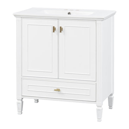 White freestanding vanity with drawer and soft-close doors, brass hardware, two-panel doors, fluted legs on Tampa Home & Garden Store