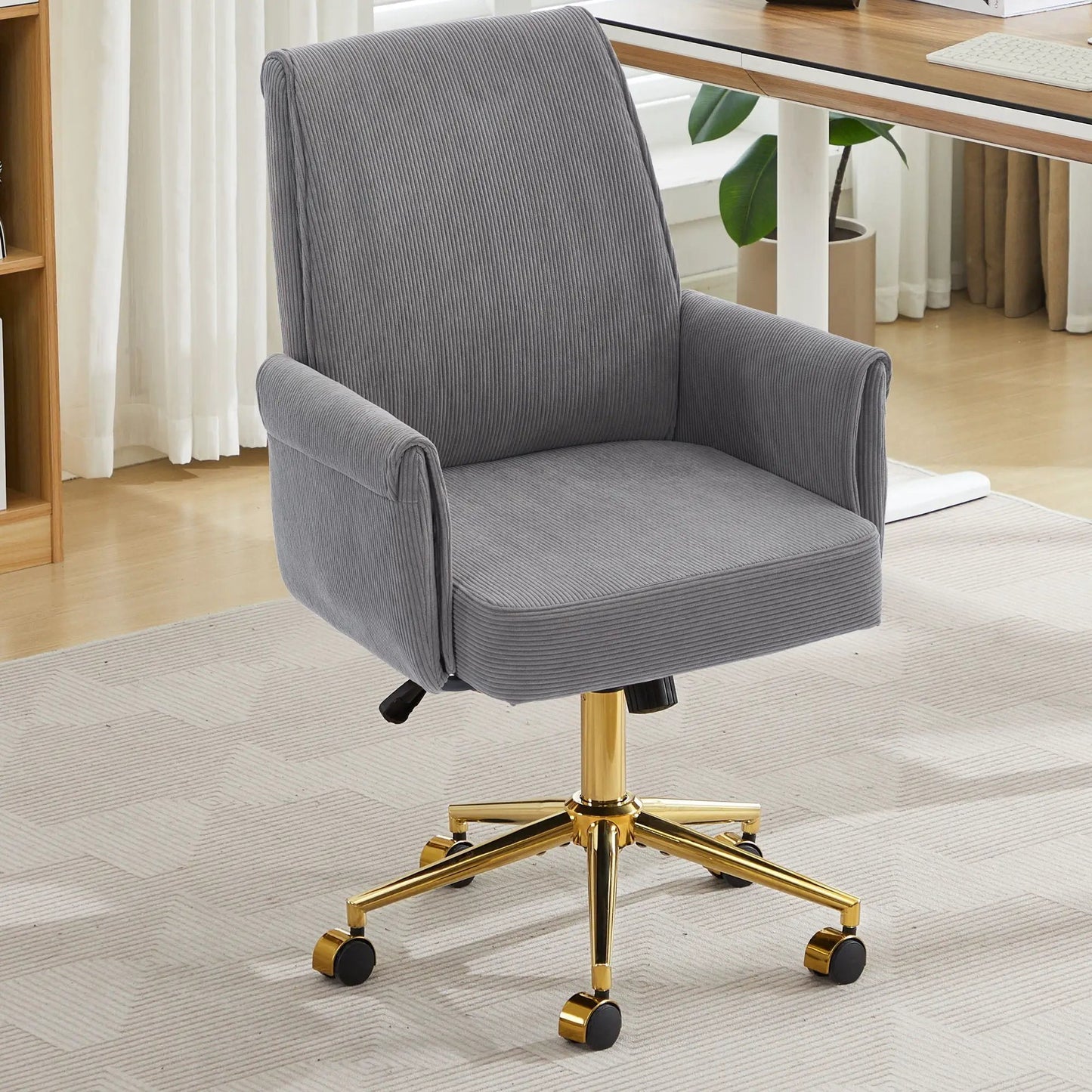Ergonomic mid-back swivel office chair in gray corduroy with a gold pedestal base on Tampa Home & Garden Store