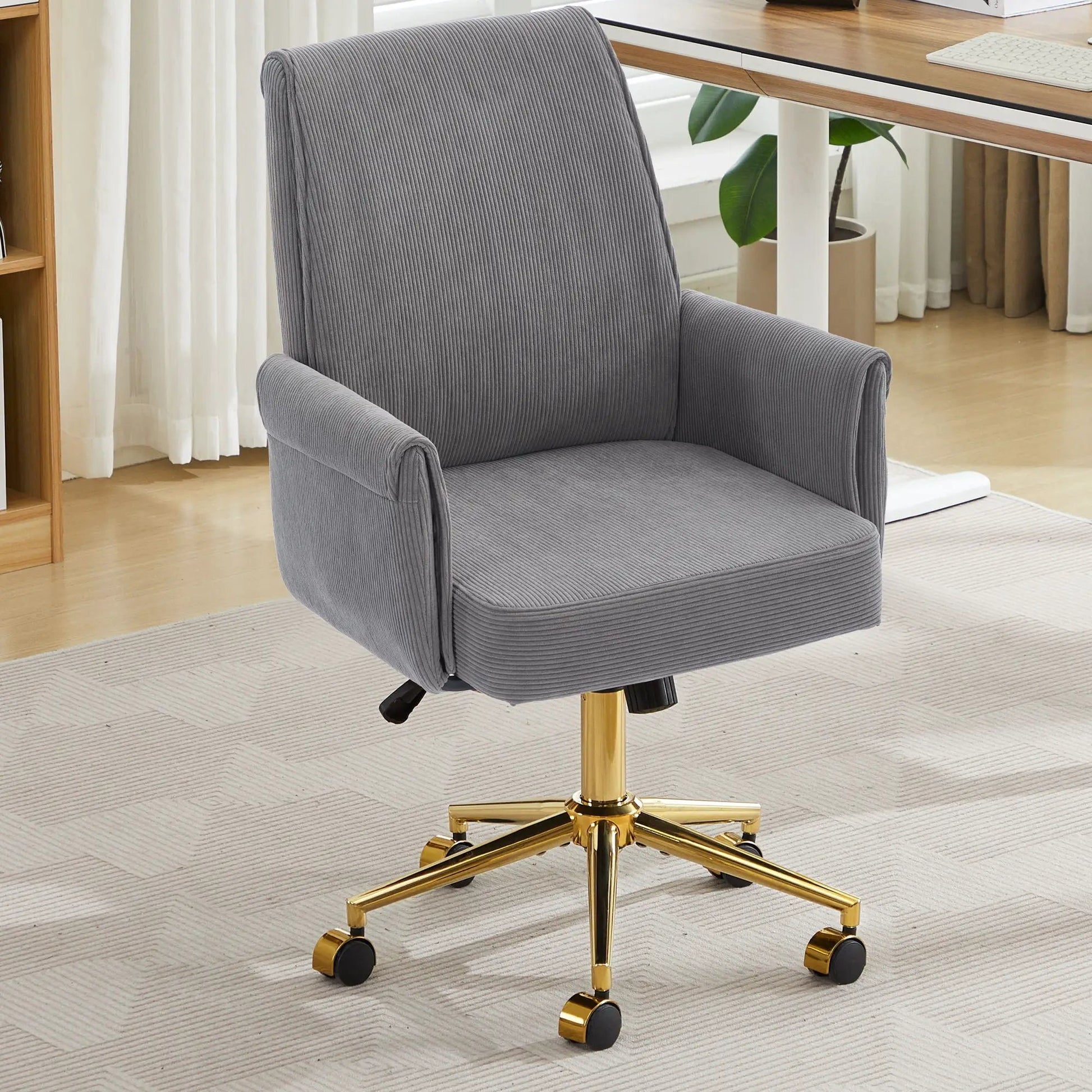 Ergonomic mid-back swivel office chair in gray corduroy with a gold pedestal base on Tampa Home & Garden Store