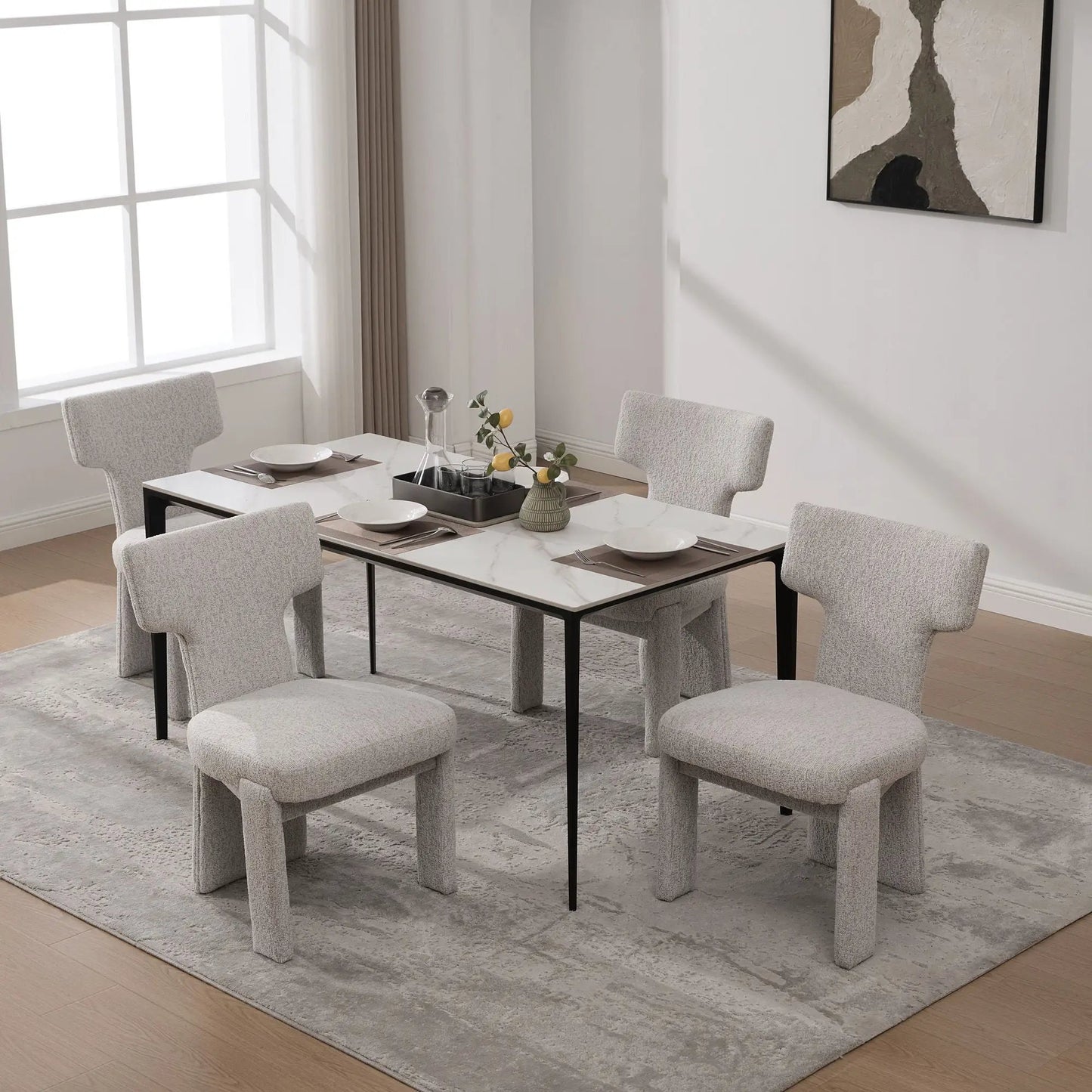 Armless curved-back accent chairs in light gray fabric around a table on Tampa Home & Garden Store