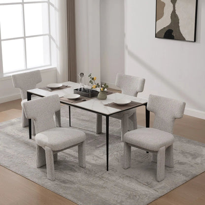 Armless curved-back accent chairs in light gray fabric around a table on Tampa Home & Garden Store