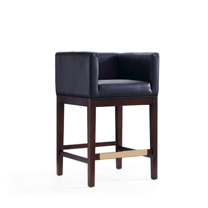 Counter stool with navy upholstered seat and beech wood frame, dark legs, gold footrest on Tampa Home & Garden Store
