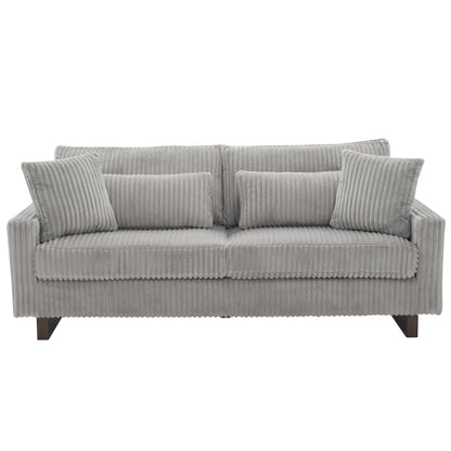 Modern grey corduroy loveseat with four ribbed pillows and wooden legs on Tampa Home & Garden Store