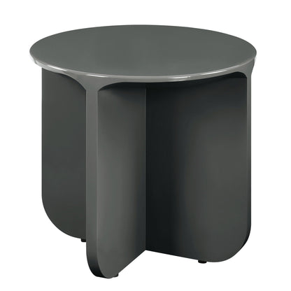 Modern aesthetic coffee table with round dark green glossy top and sculptural gray base on Tampa Home & Garden Store