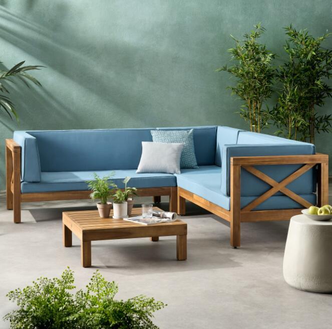 Brava X-Back 4-Piece Outdoor Sofa Set in blue with wood frame and coffee table on Tampa Home & Garden Store