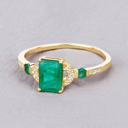 Emerald and diamond ring in 14K yellow gold with a rectangular Zambian emerald center by Bids.com on Tampa Home & Garden Store