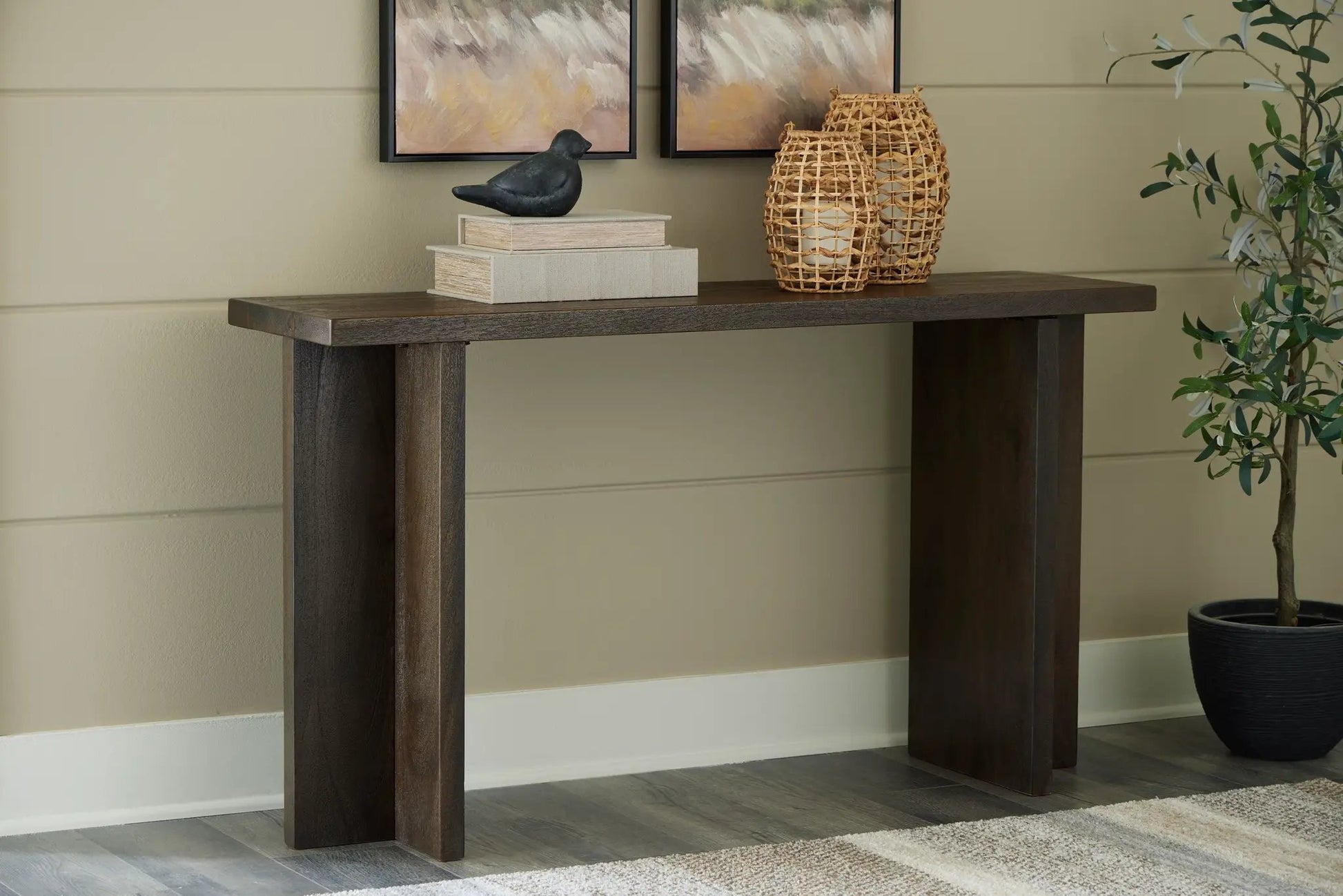 Jalenry Console Sofa Table in grayish brown wood finish with two books on Tampa Home & Garden Store