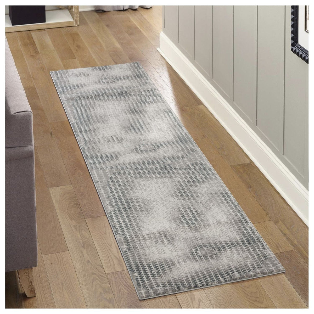 Gray contemporary area rug with Geometrix pattern by HouseOfZazla in muted gray tones on Tampa Home & Garden Store