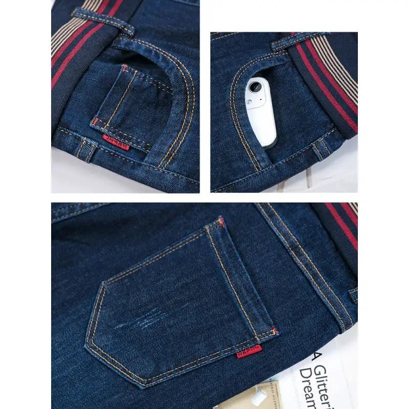 Elastic waist velvet padded denim jeans by FLIPSTYLEZLLC in blue wash with striped waistband on Tampa Home & Garden Store