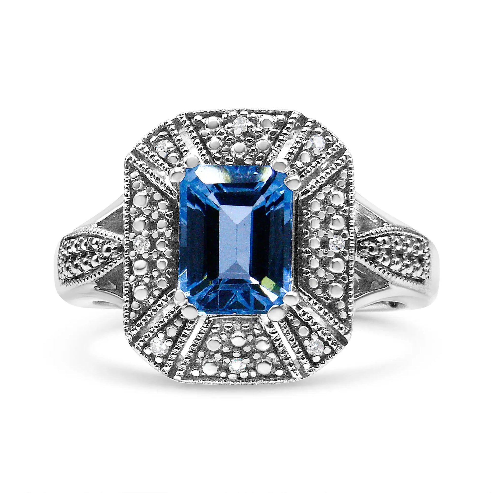 Sterling silver ring with emerald-cut blue topaz center and pavé diamonds; metalwork size 7 on Tampa Home & Garden Store