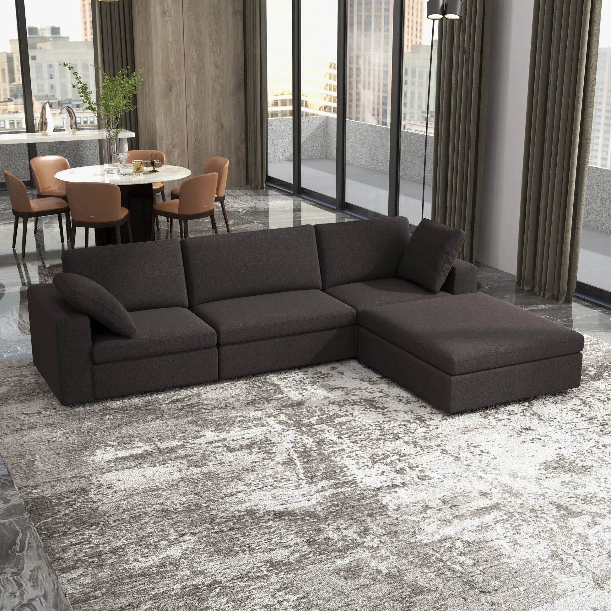 Cecilia modular corner sectional sofa in dark charcoal fabric with plush cushions in a loft on Tampa Home & Garden Store