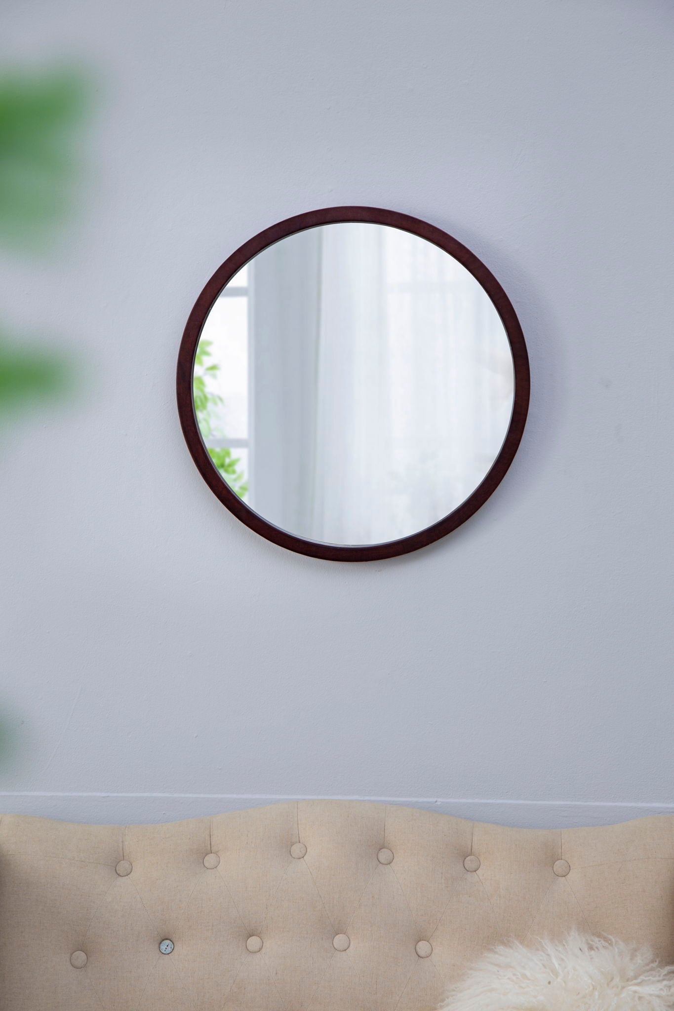 Circle wall mirror with dark wooden frame by HouseOfZazla for living room on Tampa Home & Garden Store