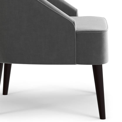 Upholstered Accent Chair with Curved Back in grey fabric, piped edges, dark wood legs on Tampa Home & Garden Store