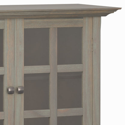 Acadian medium storage cabinet with weathered gray wood finish and paneled doors on Tampa Home & Garden Store