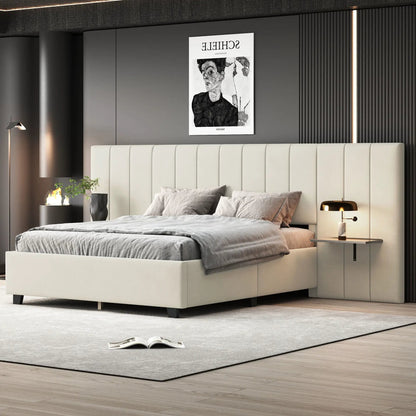 Upholstered platform bed with a large cream headboard in a modern gray bedroom on Tampa Home & Garden Store