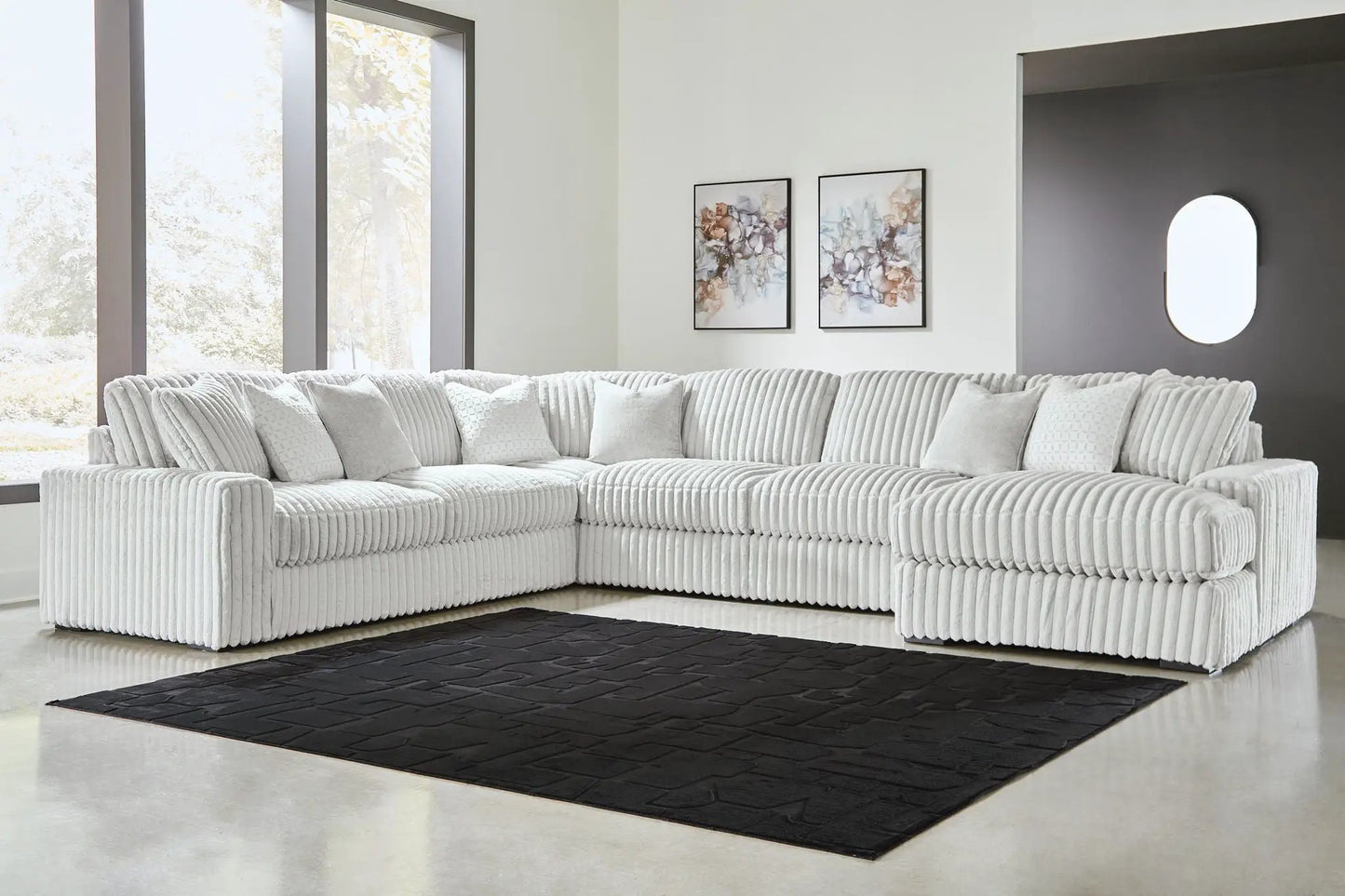 Stupendous Sectional by Unique Piece in light gray ribbed fabric for a modern living room on Tampa Home & Garden Store