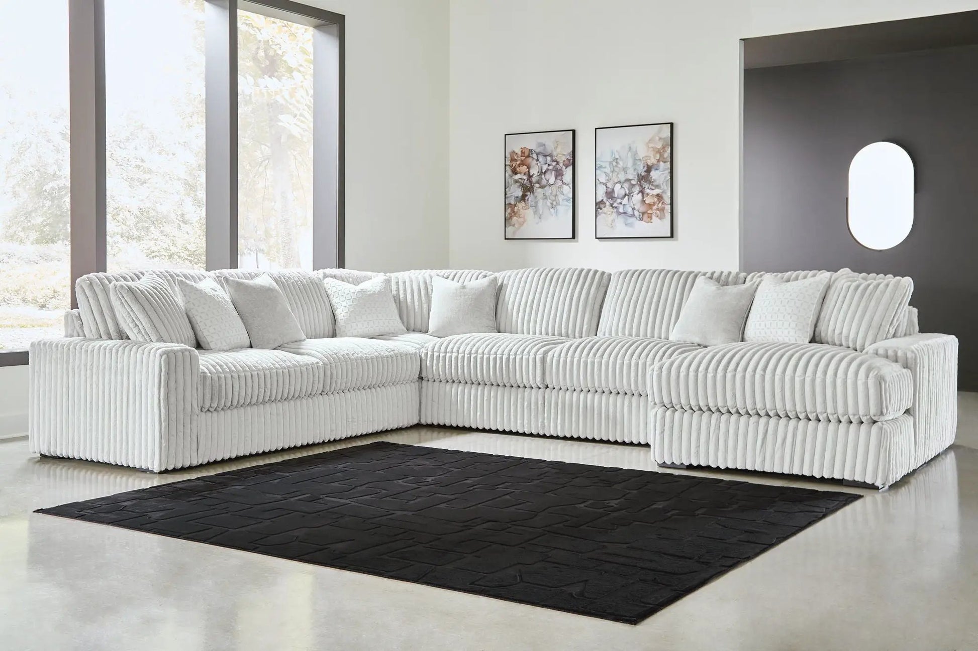 Stupendous Sectional by Unique Piece in light gray ribbed fabric for a modern living room on Tampa Home & Garden Store