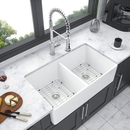 White apron-front double-bowl 32in sink with chrome faucet and grid mats HouseOfZazla on Tampa Home & Garden Store