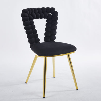 Modern chair set with black cushioned seat and bead-backrest, gold legs on Tampa Home & Garden Store