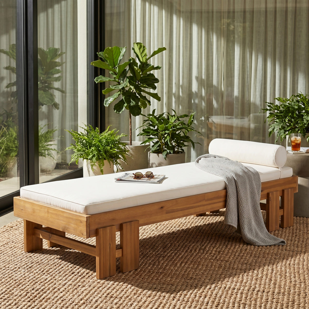 Teak finish acacia wood daybed with cream cushion on outdoor patio seating HouseOfZazla on Tampa Home & Garden Store