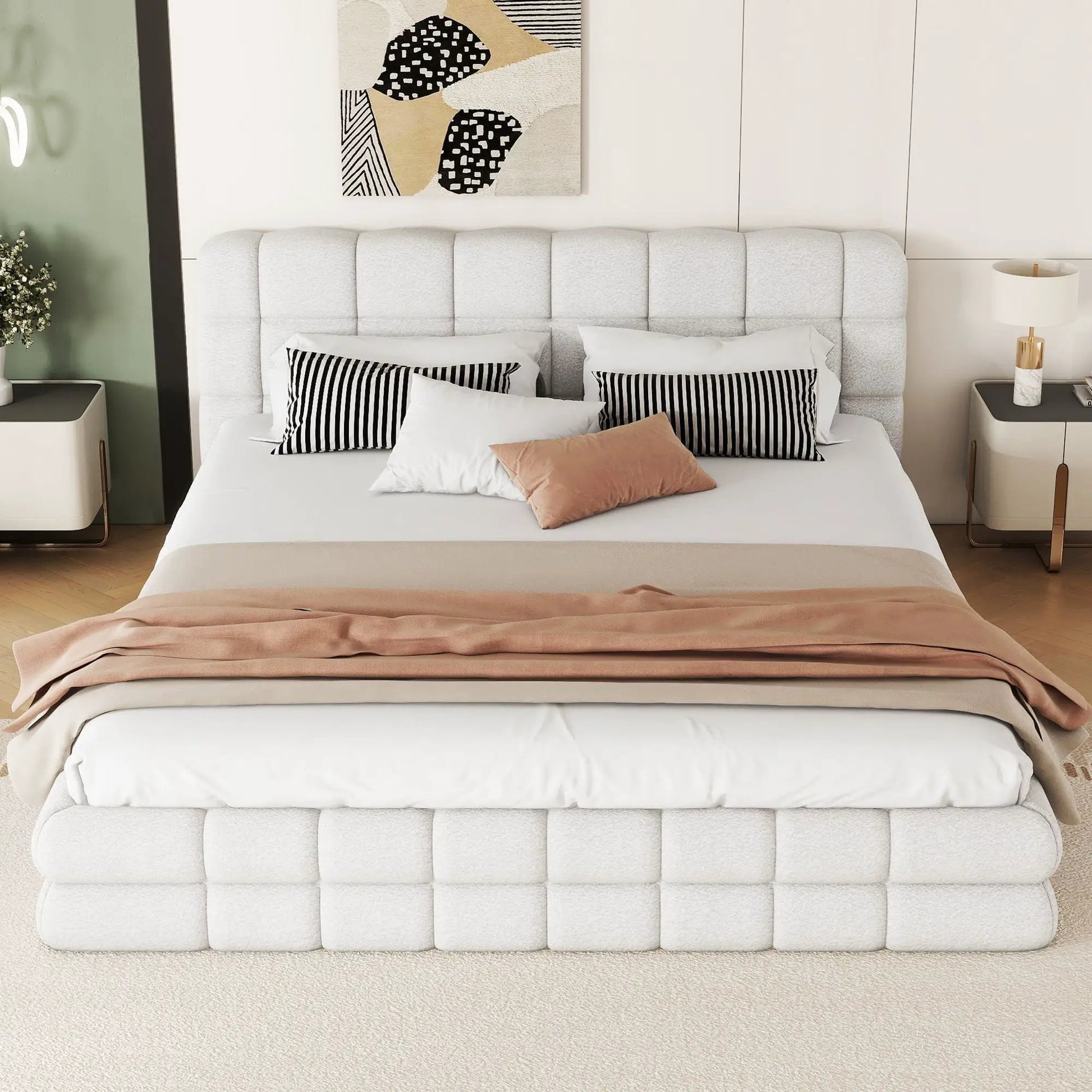 Upholstered platform bed with a tufted light gray headboard in a modern bedroom on Tampa Home & Garden Store