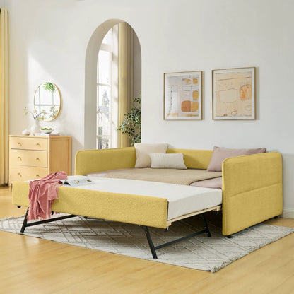 Upholstered daybed with pop-up trundle in yellow fabric, black metal legs in bright living room on Tampa Home & Garden Store