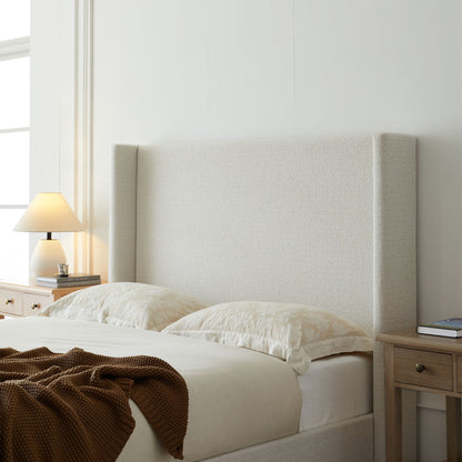 Hale Upholstered Wingback Bed in cream fabric with tall winged headboard on Tampa Home & Garden Store