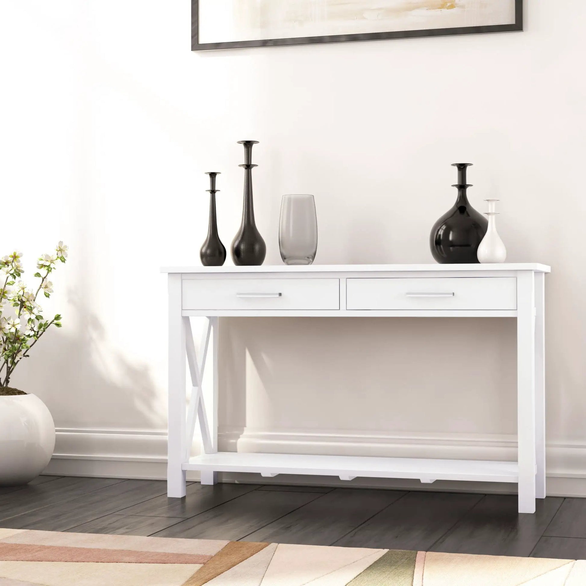 Kitchener Handcrafted Console Table, white finish, topped with black glass vases on Tampa Home & Garden Store