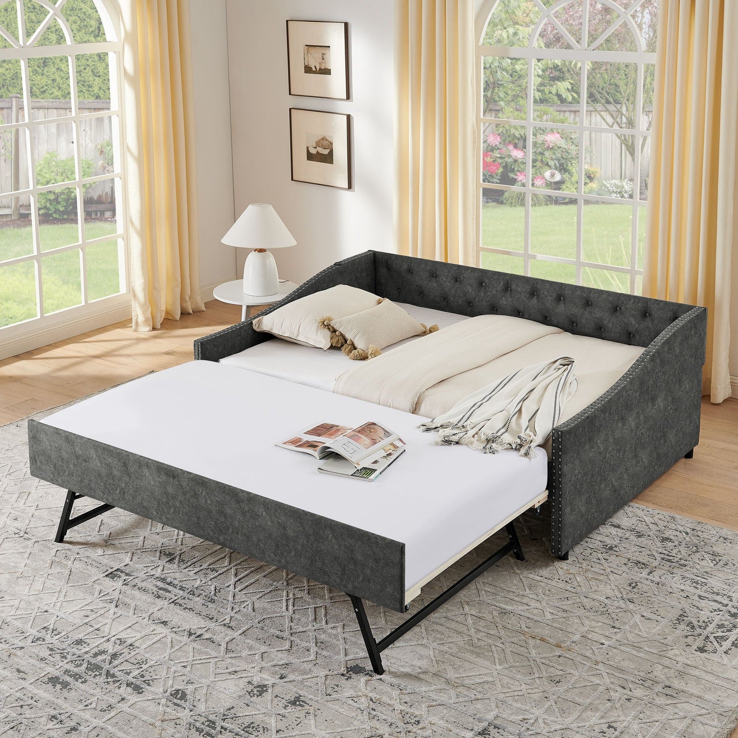 HouseOfZazla gray upholstered daybed with pull-out trundle and tufted sides in bright room on Tampa Home & Garden Store