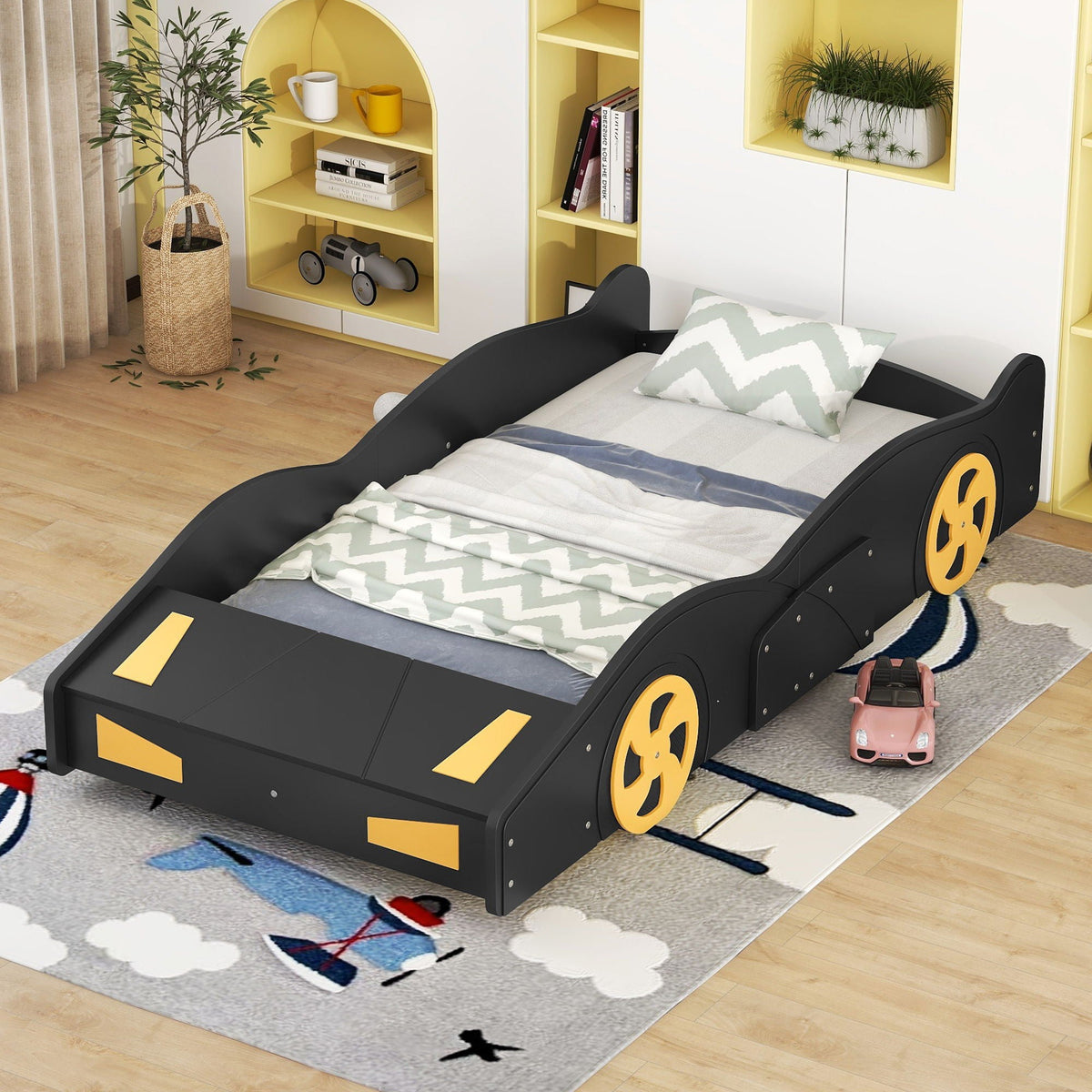 Race car shaped platform bed with wheels and storage, black frame with yellow accents on Tampa Home & Garden Store