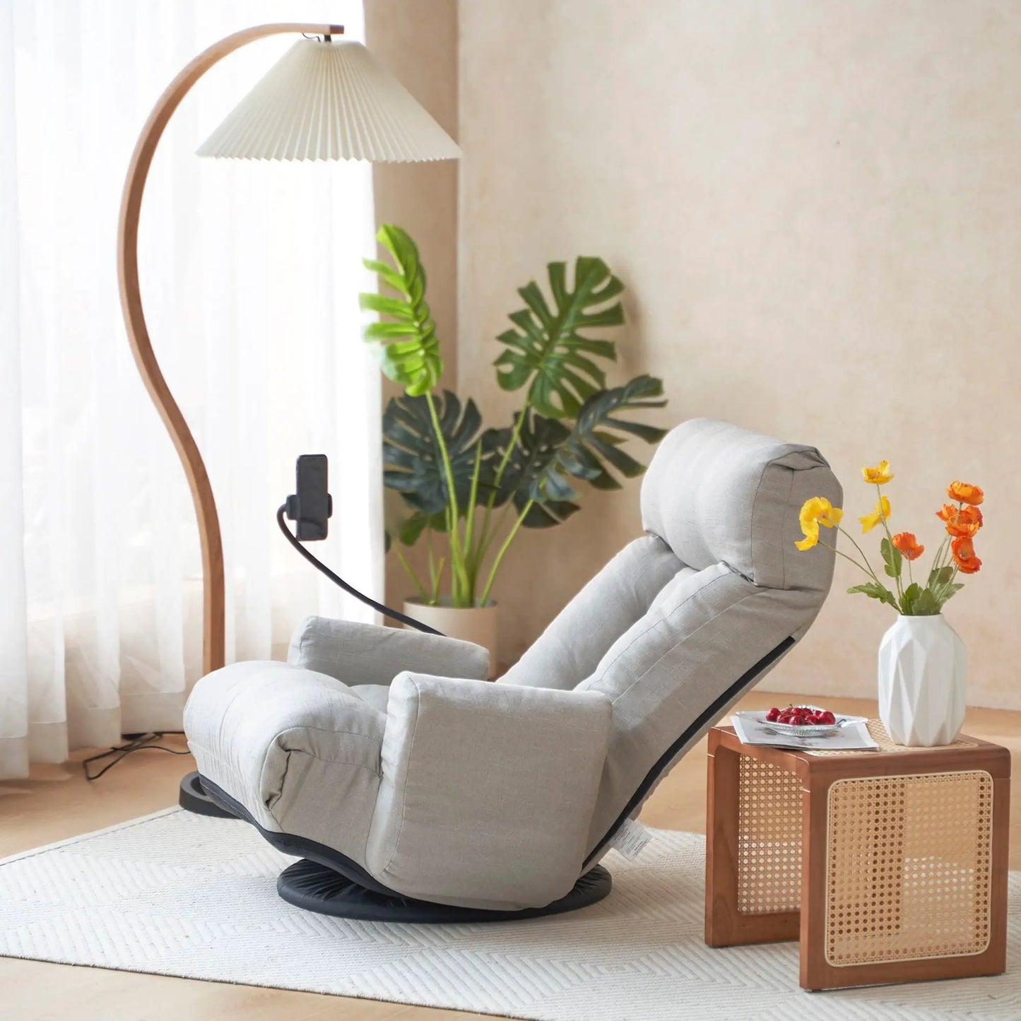Adjustable swivel lounge chair with 360° rotating seat and headrest in gray upholstery on Tampa Home & Garden Store