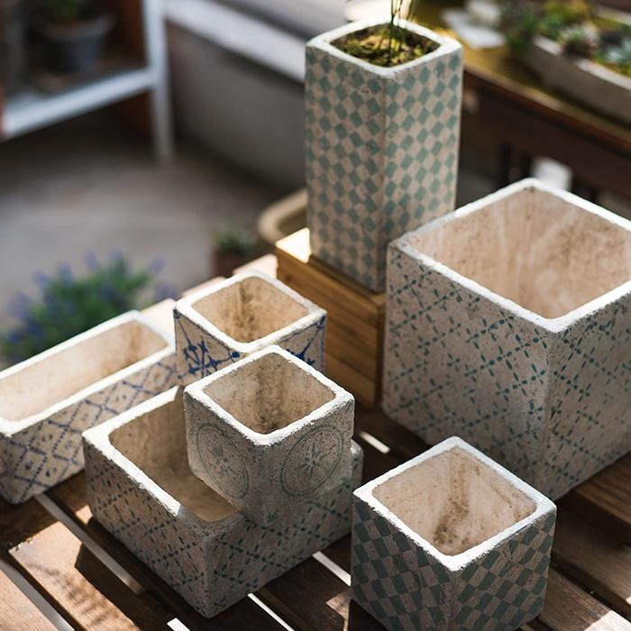 RusticReach cement planters: 3 blue diamond patterns in square planters (small, med, tall) on Tampa Home & Garden Store