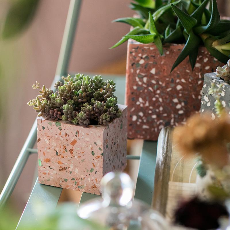 Three cement planters in pink terrazzo, terracotta, and gray with succulents RusticReach on Tampa Home & Garden Store