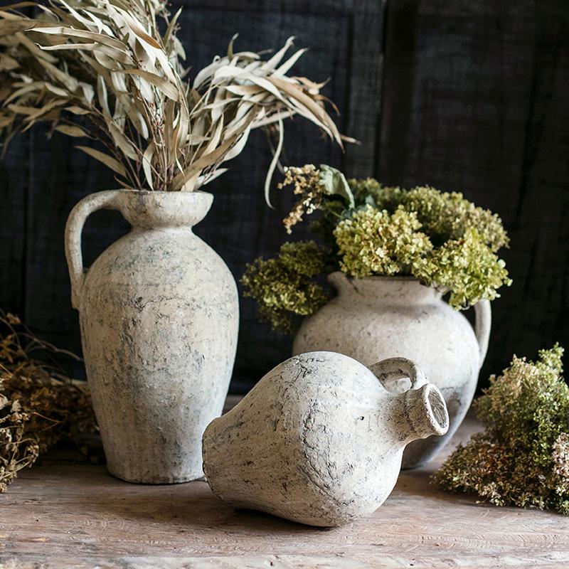Three cement Pompeii-style amphora vases with weathered beige finish on Tampa Home & Garden Store