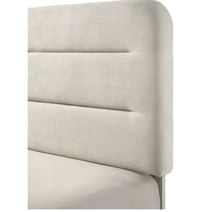 Upholstered panel bed headboard in beige textured fabric with sleek lines on Tampa Home & Garden Store