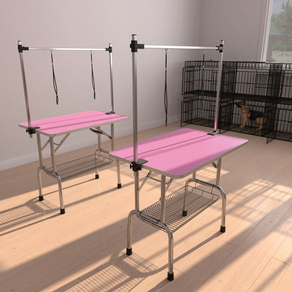 Dual folding dog grooming tables with stainless steel frame and pink mats at 2 stations on Tampa Home & Garden Store