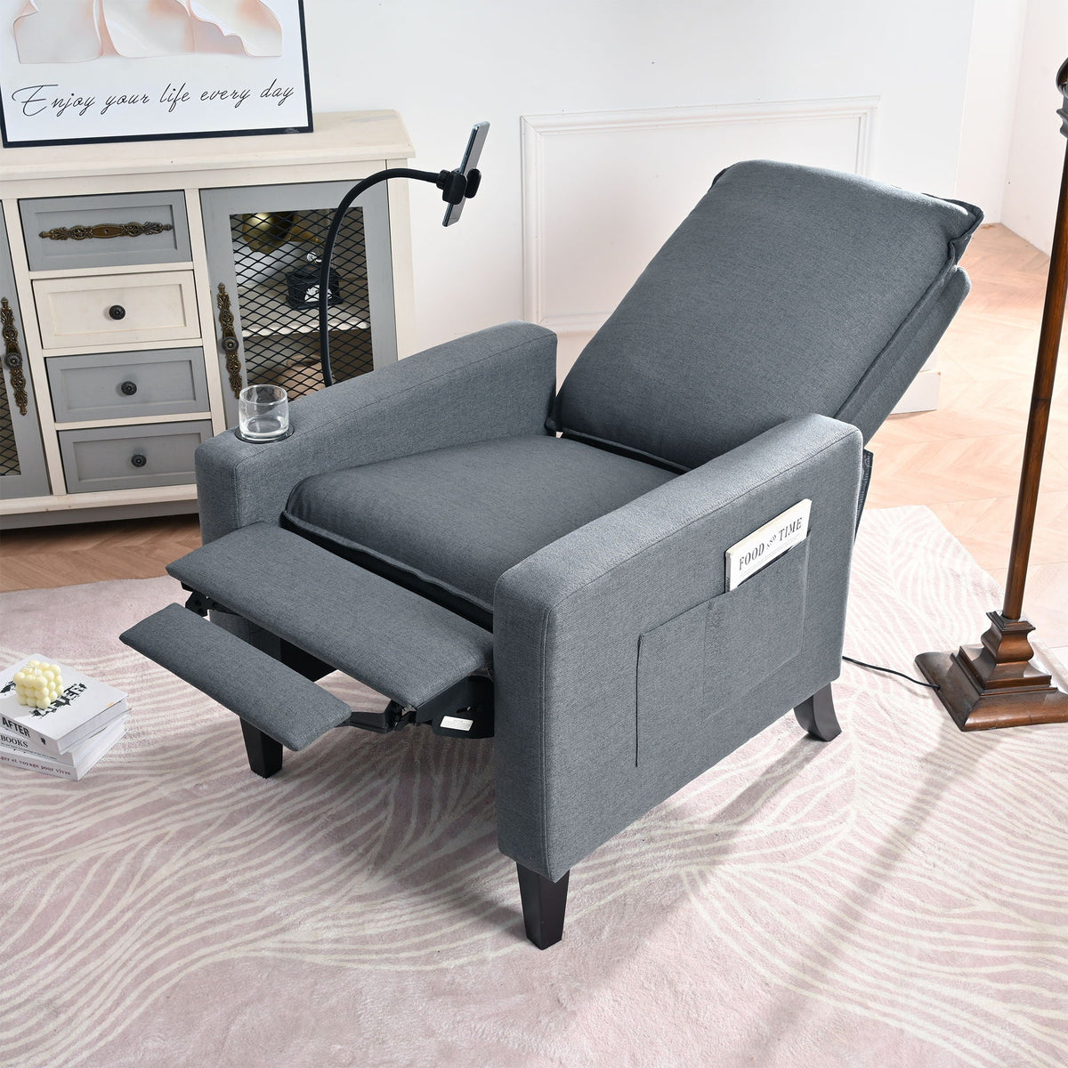 Recliner chair in gray fabric with an adjustable footrest and built-in phone holder on Tampa Home & Garden Store