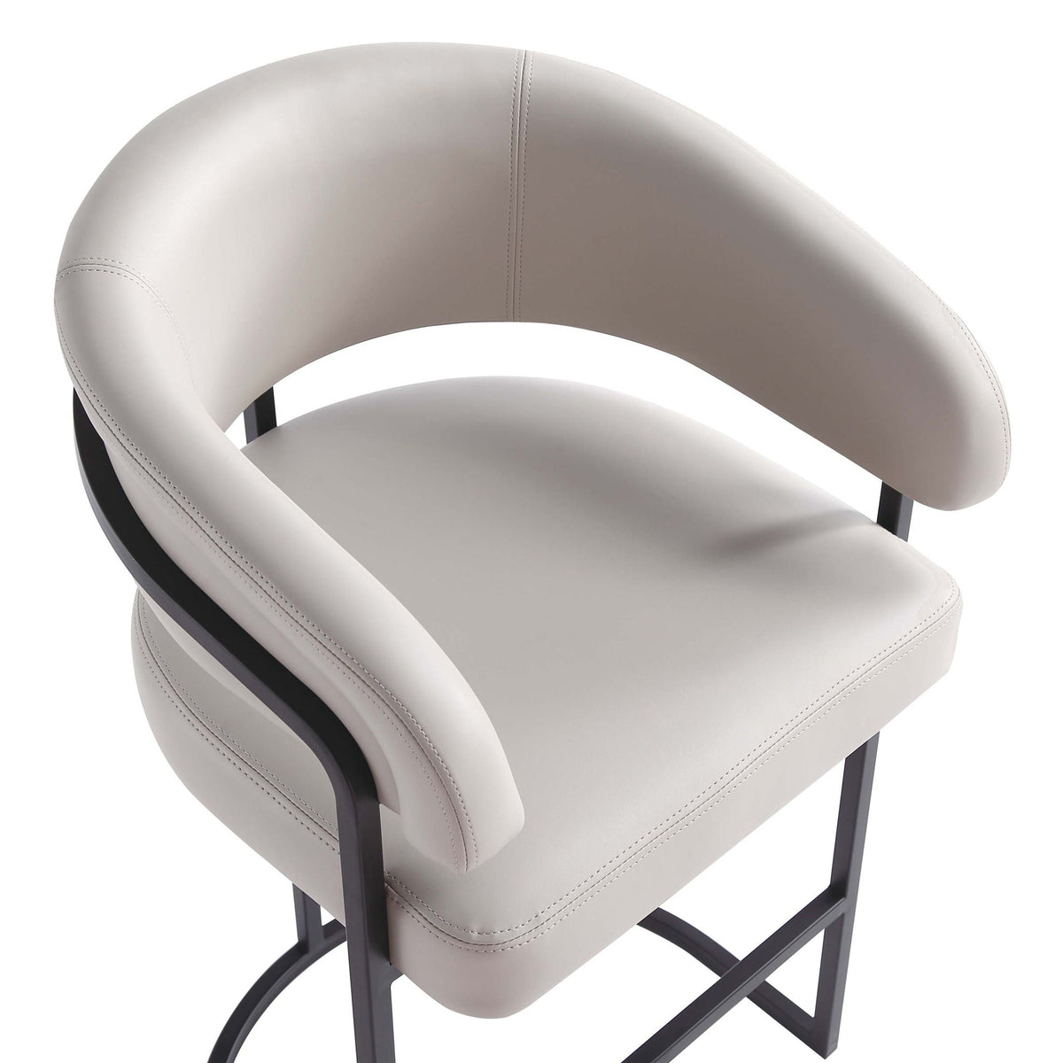 Augusta Counter Stool in light grey faux leather with curved back and black metal legs on Tampa Home & Garden Store