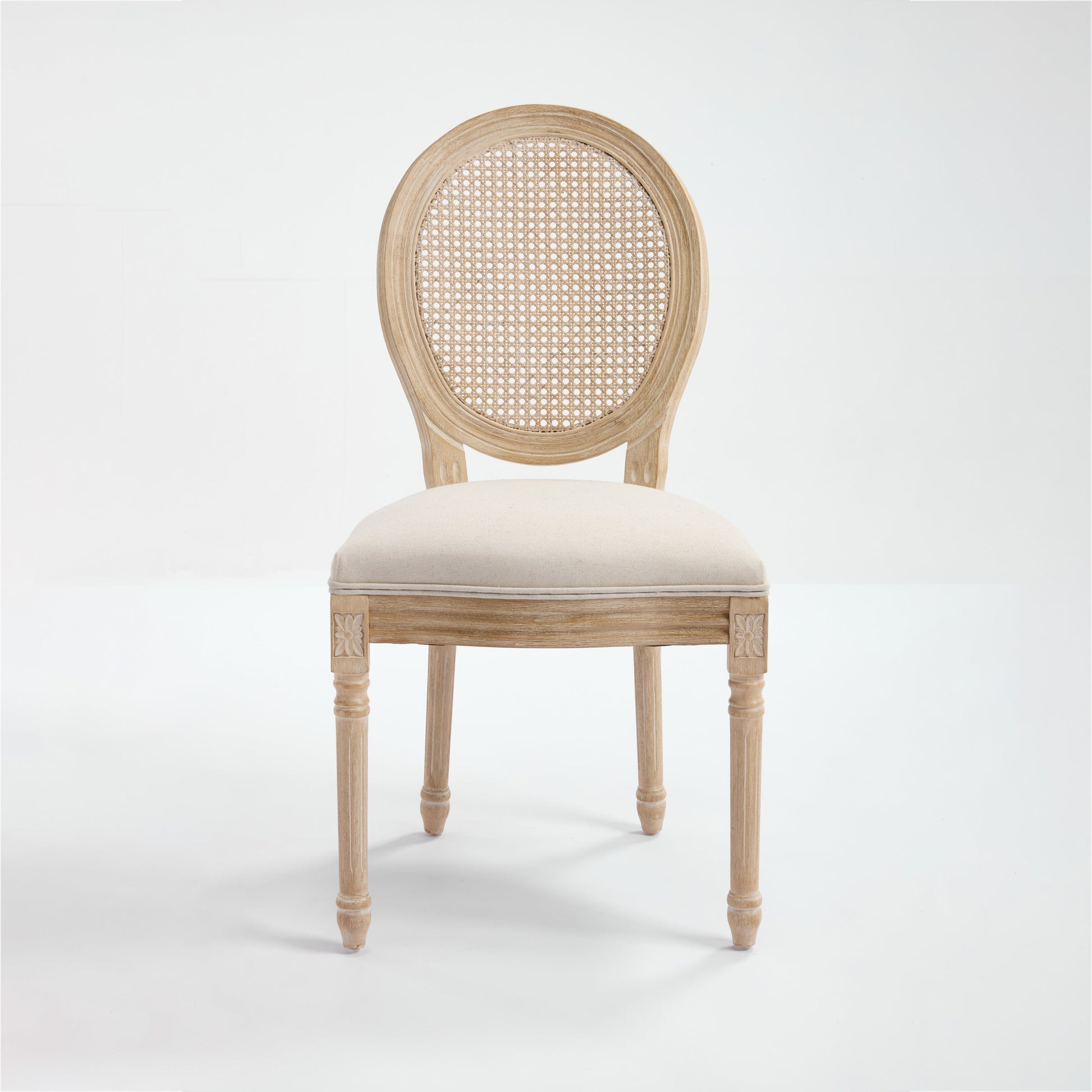 Dining chair with rattan back, French country style, wood frame and beige upholstered seat on Tampa Home & Garden Store