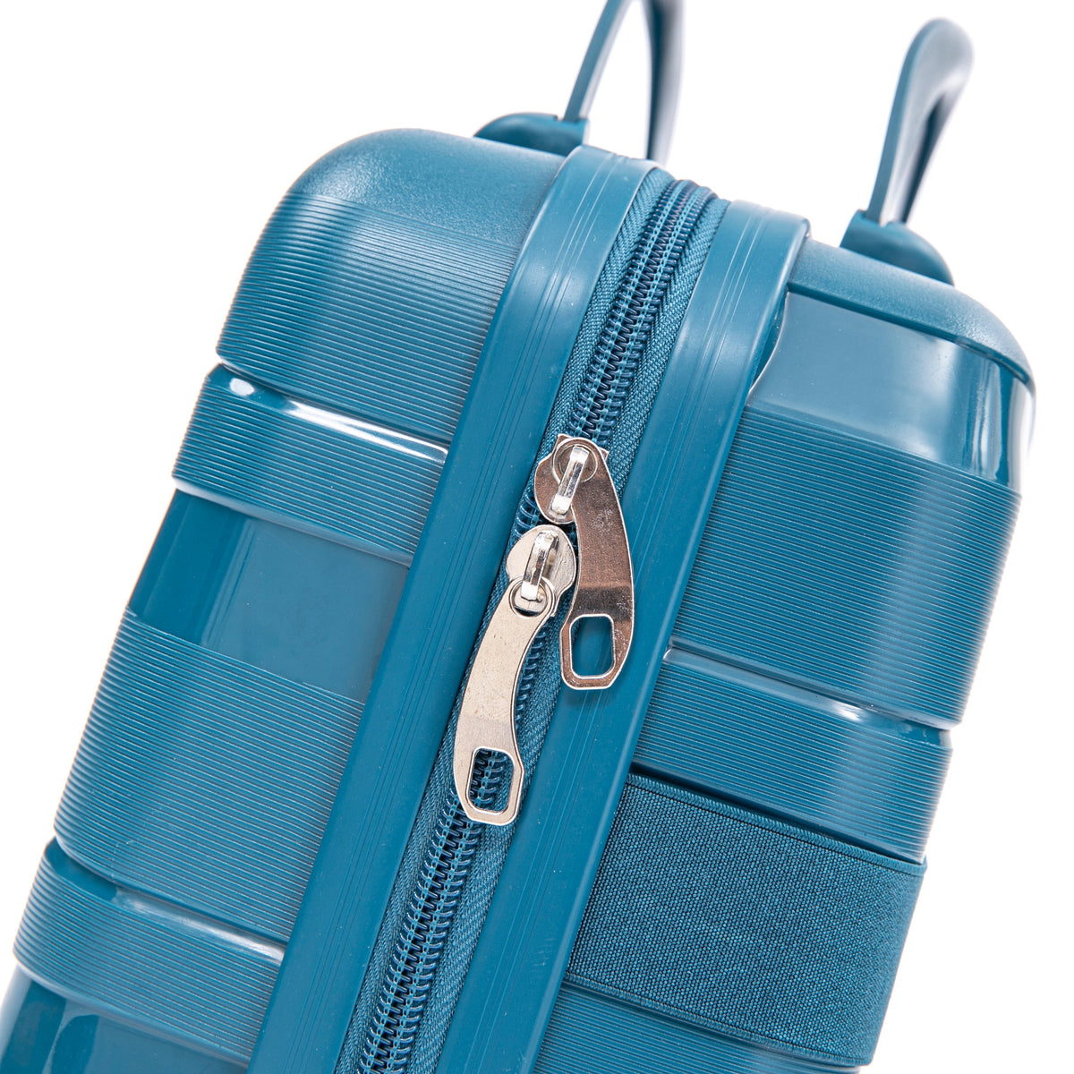 Blue hard-case luggage close-up with textured ridges and dual zippers; 4-piece spinner set on Tampa Home & Garden Store
