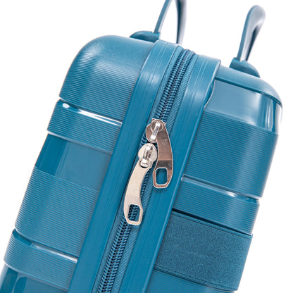 Blue hard-case luggage close-up with textured ridges and dual zippers; 4-piece spinner set on Tampa Home & Garden Store